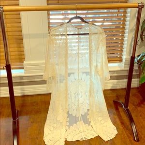 Women’s white flowing wrap